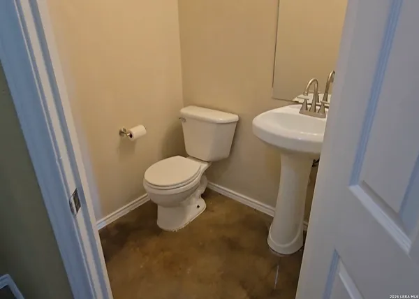 a bathroom with a sink and a toilet