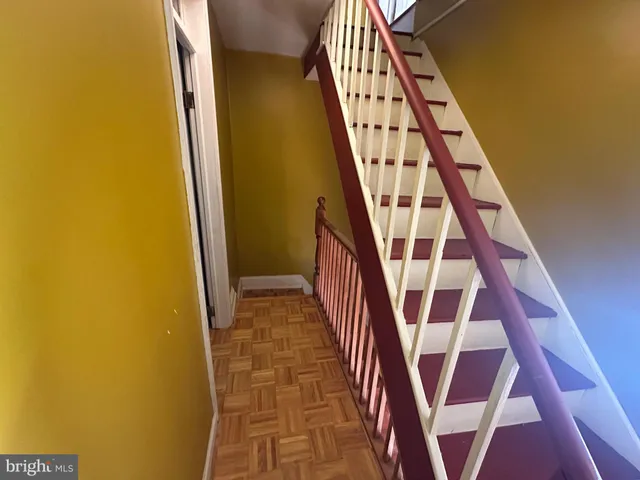 a view of entryway with wooden floor