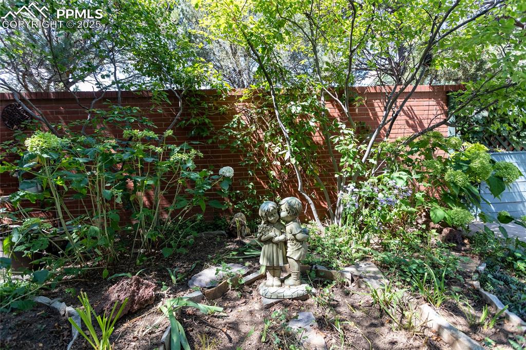 2650 Spring Grove Terrace Colorado Springs, CO 80906 - Photo 31 of 35 Quaint little garden inside the patio