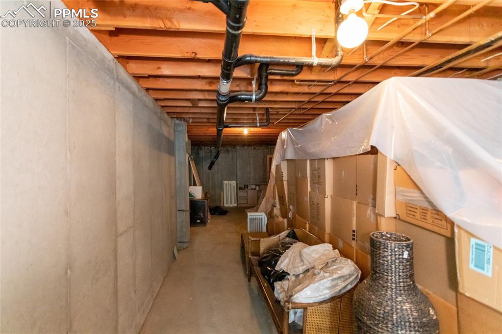 2650 Spring Grove Terrace Colorado Springs, CO 80906 - Photo 33 of 35 Unfinished basement featuring radiator