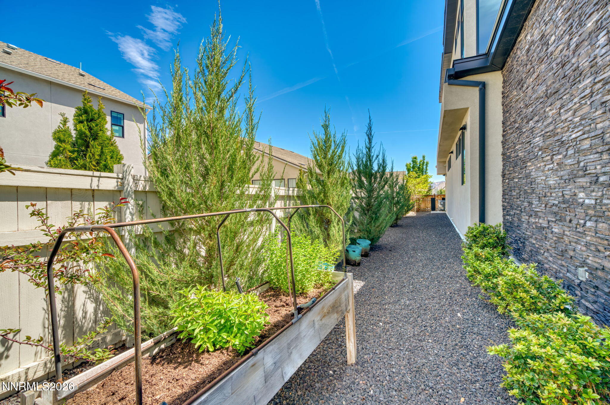 6141 Triple Crown Drive Reno, NV 89511 - Photo 29 of 71 a view of a house with a yard