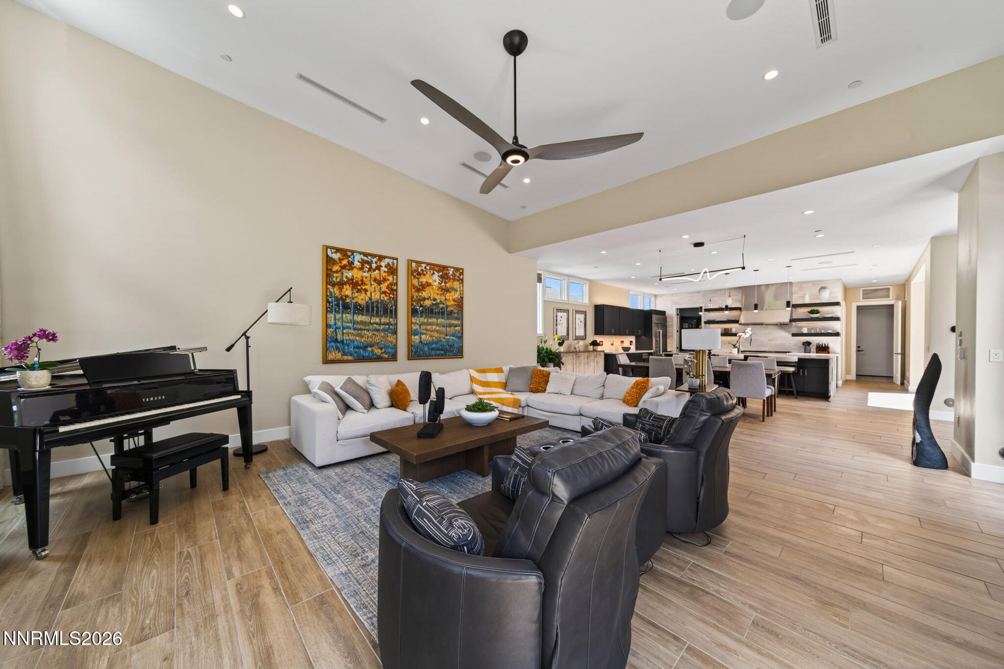 6141 Triple Crown Drive Reno, NV 89511 - Photo 39 of 71 a living room with furniture and a wooden floor