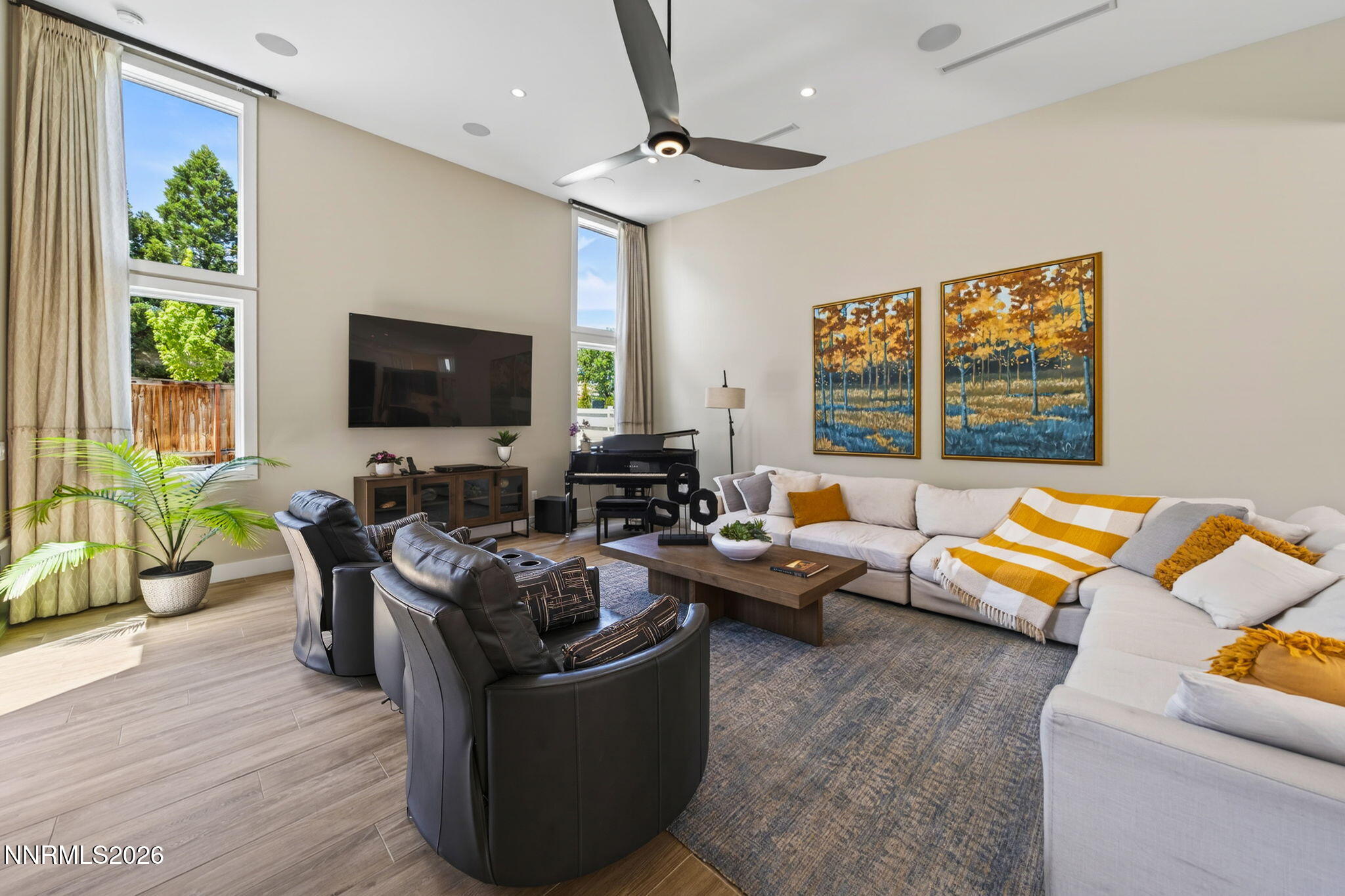 6141 Triple Crown Drive Reno, NV 89511 - Photo 40 of 71 a living room with furniture and a flat screen tv