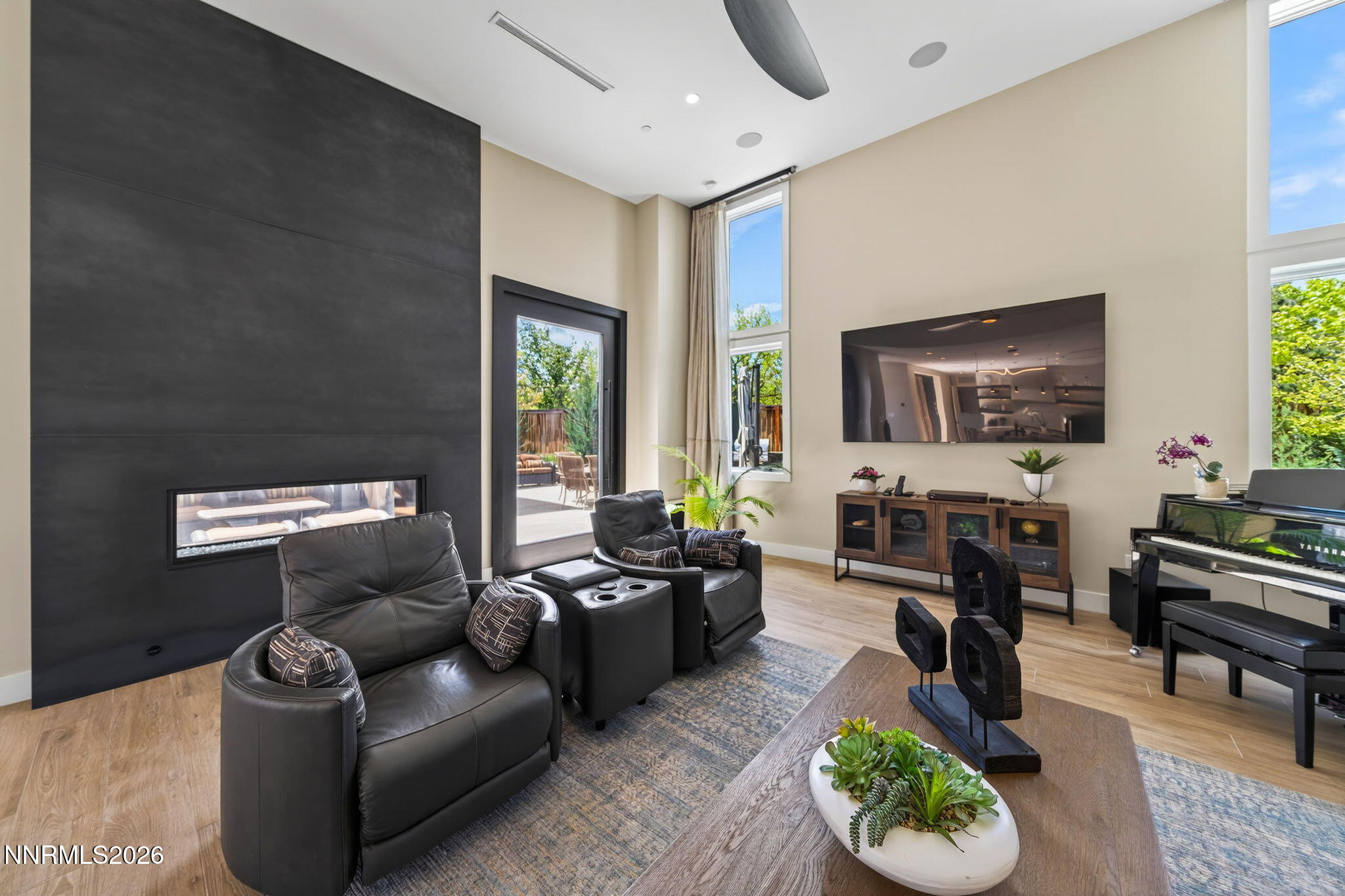 6141 Triple Crown Drive Reno, NV 89511 - Photo 42 of 71 a living room with furniture and a flat screen tv