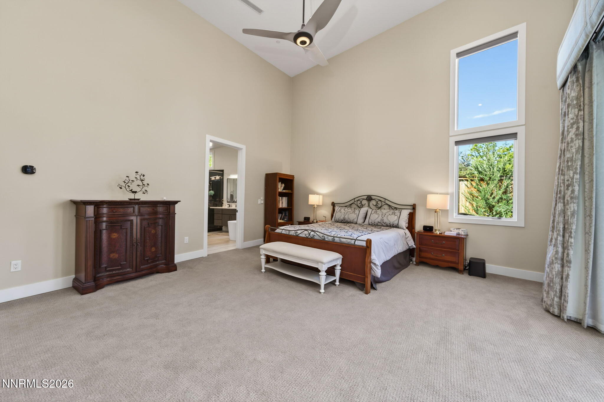6141 Triple Crown Drive Reno, NV 89511 - Photo 58 of 71 a spacious bedroom with a bed and a cabinets
