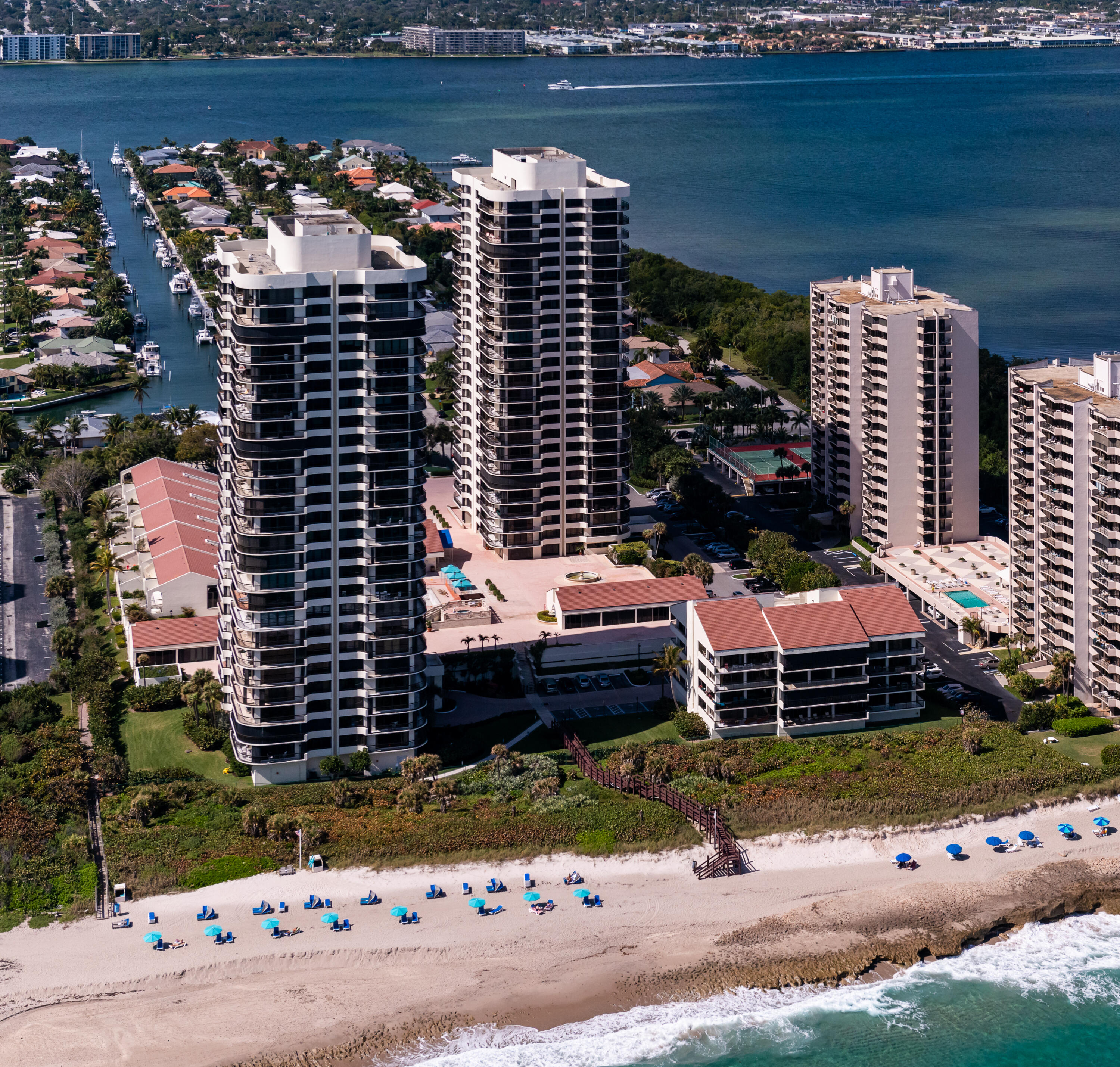 4000 North Ocean Drive, Unit 902 Singer Island, FL 33404 - Photo 50 of 53 a view of a lake with a couple of cars parked in parking lot