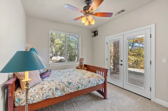 a view of a deck with a chair and table