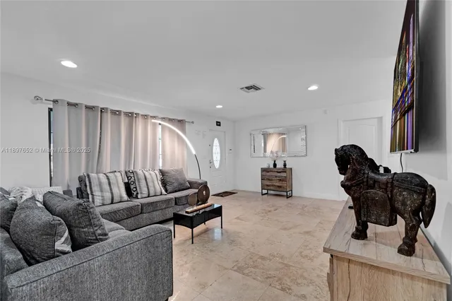 a view of a workspace with furniture