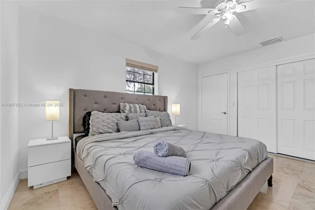 a view of a hall with an entryway