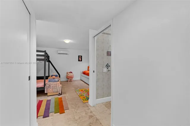 a bedroom with furniture and a bed