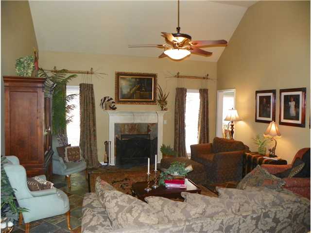 730 Coleherne Road Collierville, TN 38017 - Photo 3 of 12 Large greatroom with slate flooring, gas fireplace, updated fixtures, and and vaulted ceiling