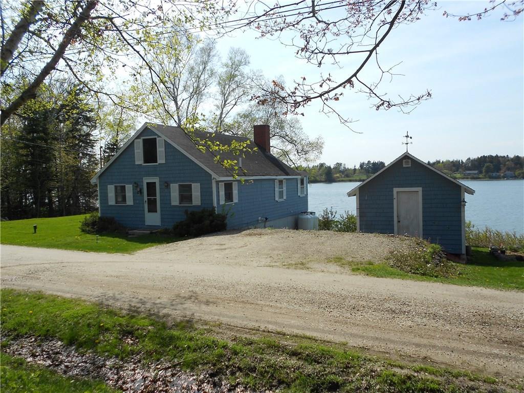 View of cottage, storage building...