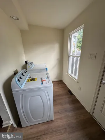a utility room with washer and dryer