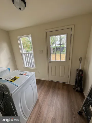 a storage & utility room with a window