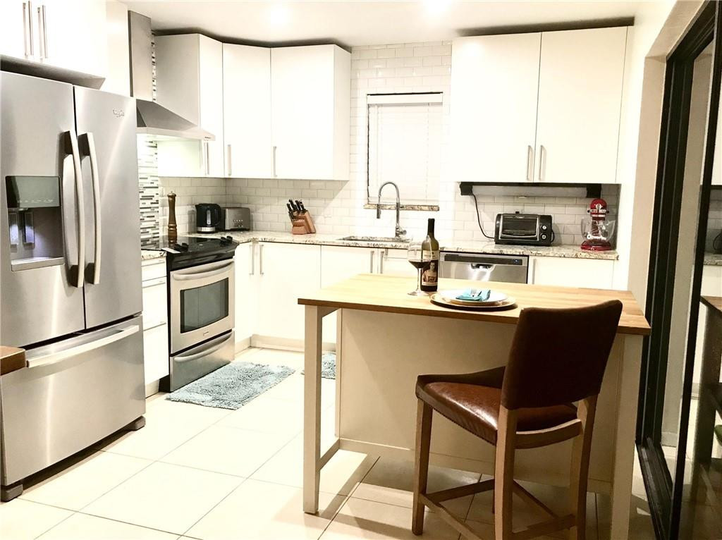 7763 Courtyard Run West, Unit 173 Boca Raton, FL 33433 - Photo 1 of 29 KITCHEN