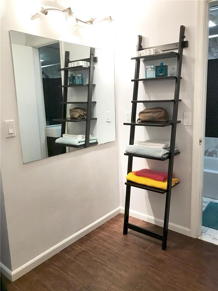 7763 Courtyard Run West, Unit 173 Boca Raton, FL 33433 - Photo 13 of 29 HALLWAY TO GUEST BATH