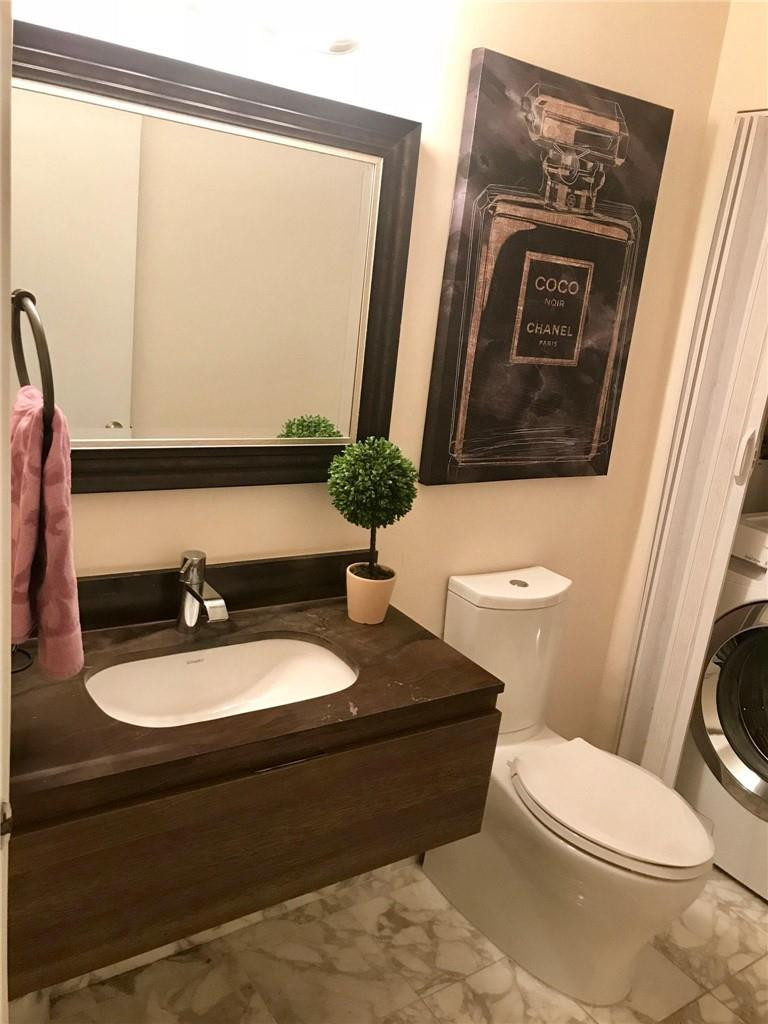 7763 Courtyard Run West, Unit 173 Boca Raton, FL 33433 - Photo 8 of 29 FIRST FLOOR HALF BATH