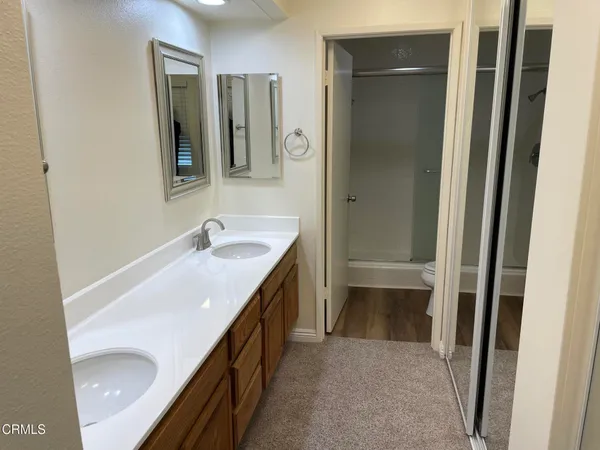 a bathroom with a shower and a toilet