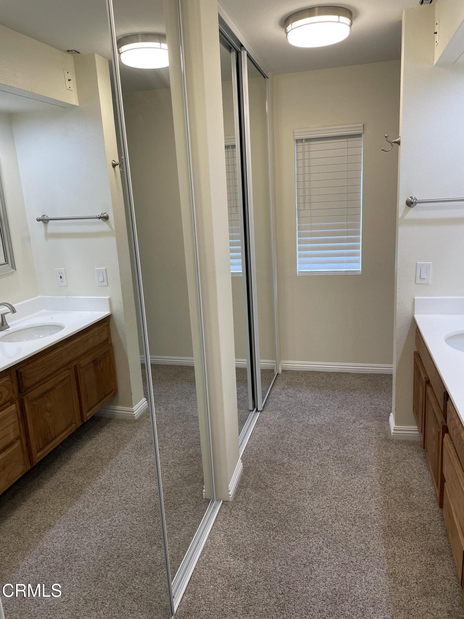 2585 Pheasant Hill Road Camarillo, CA 93010 - Photo 18 of 23 a bathroom with a sink and a mirror