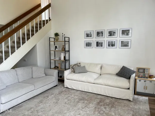 a kitchen that has a sink and a stove in it