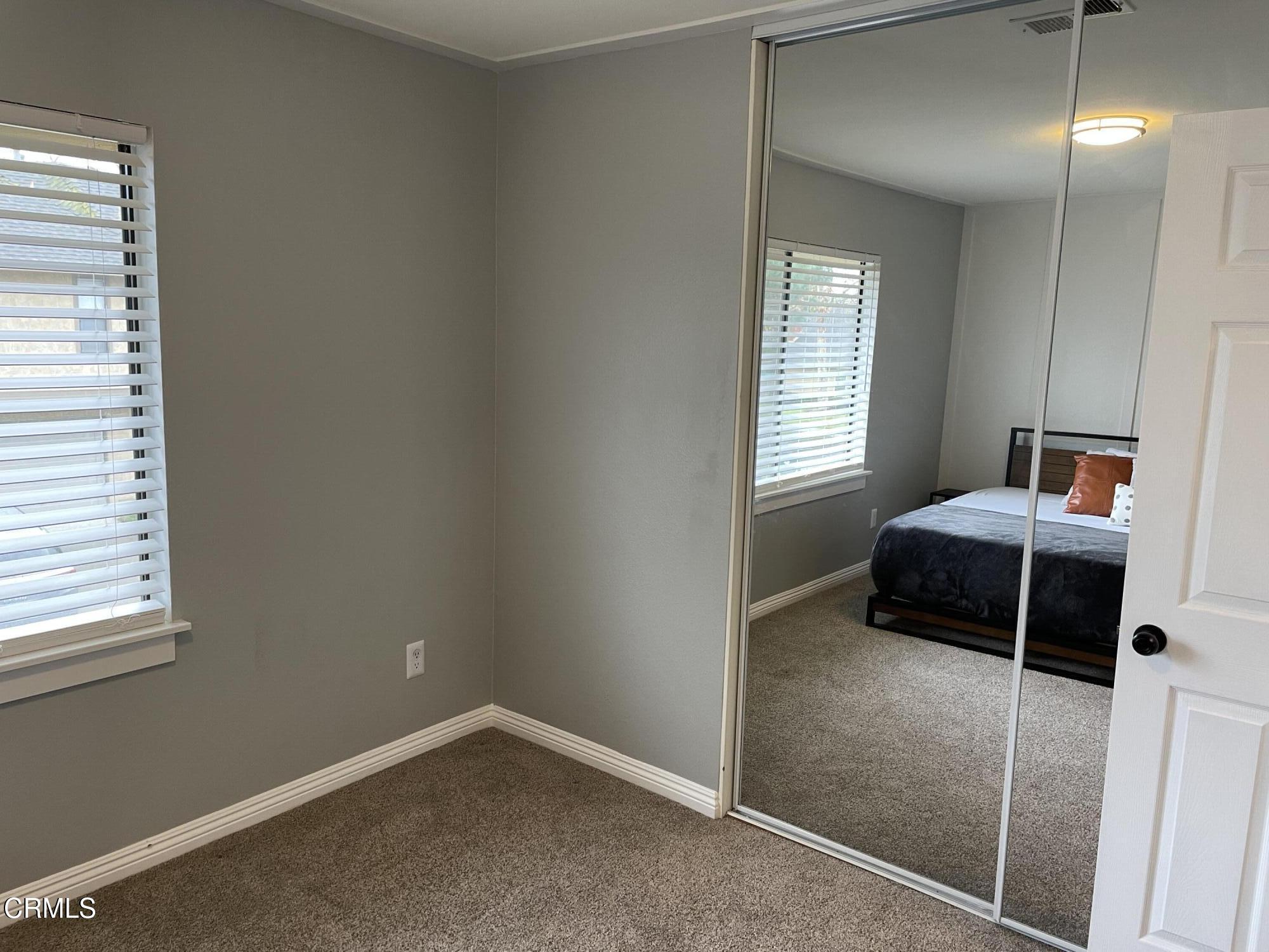 2585 Pheasant Hill Road Camarillo, CA 93010 - Photo 9 of 23 a bedroom with a bed and a window