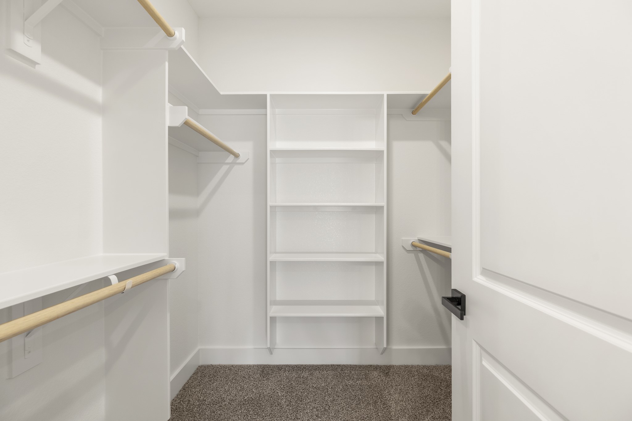 6330 Del Rio Street Houston, TX 77021 - Photo 22 of 39 a view of walk in closet with empty racks