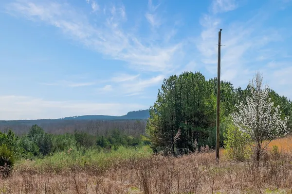 a view of a lake with outdoor space
