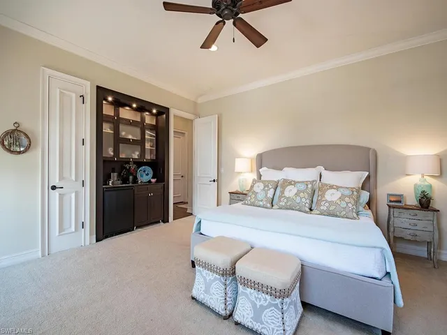 a bedroom with a bed and closet