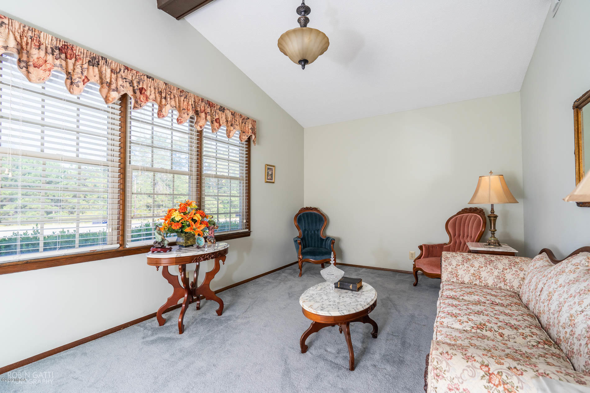 6702 Goodall Mill Road Macon, GA 31216 - Photo 2 of 32 a living room with furniture and a window