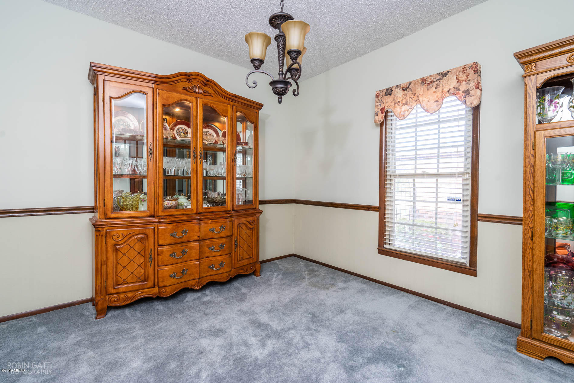 6702 Goodall Mill Road Macon, GA 31216 - Photo 12 of 32 wooden floor in an empty room with a window