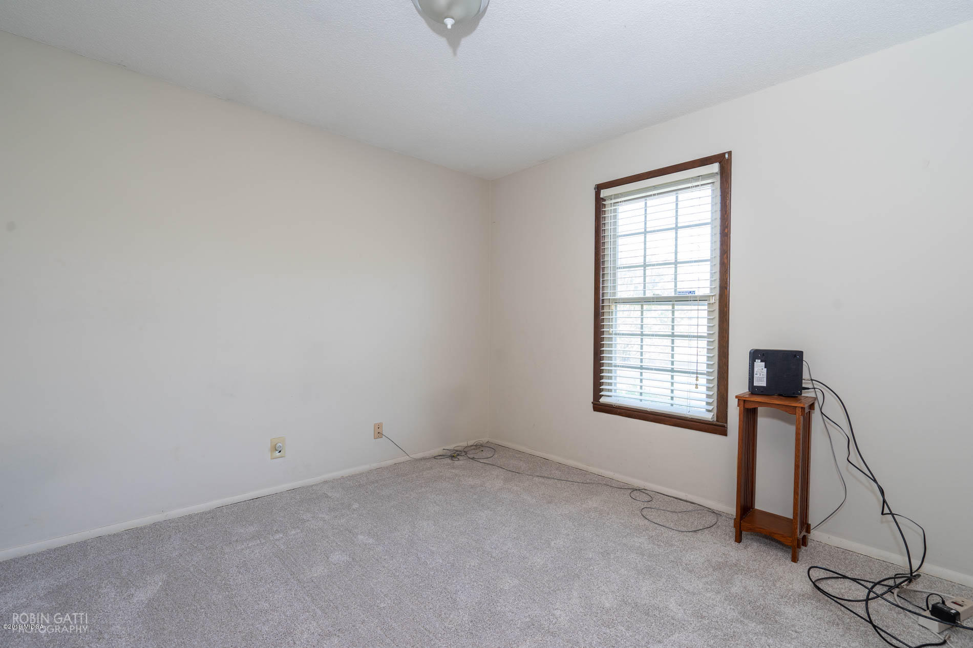 6702 Goodall Mill Road Macon, GA 31216 - Photo 27 of 32 an empty room with windows