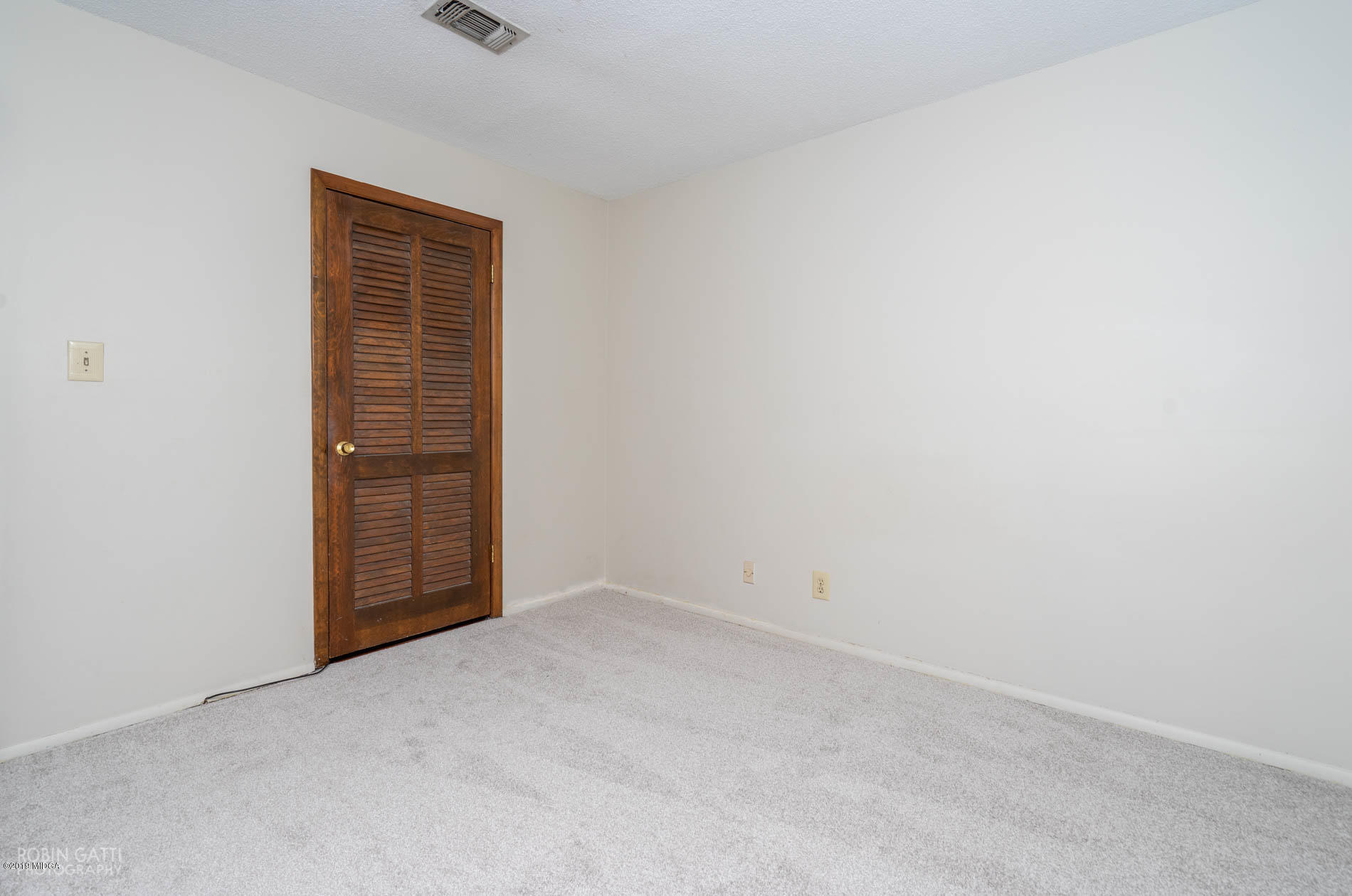 6702 Goodall Mill Road Macon, GA 31216 - Photo 30 of 32 an empty room with windows