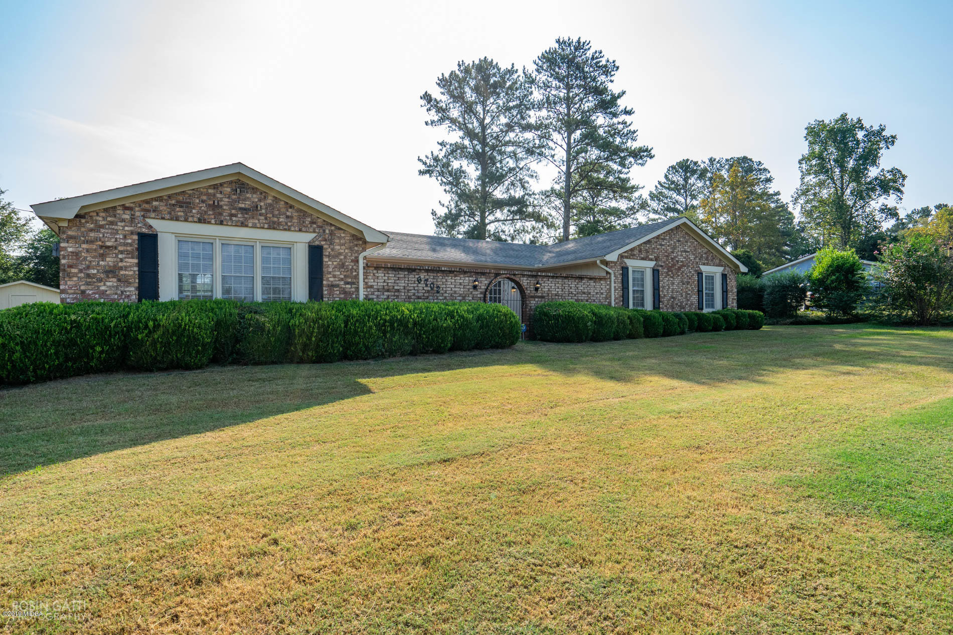 6702 Goodall Mill Road Macon, GA 31216 - Photo 31 of 32 a front view of a house with a yard