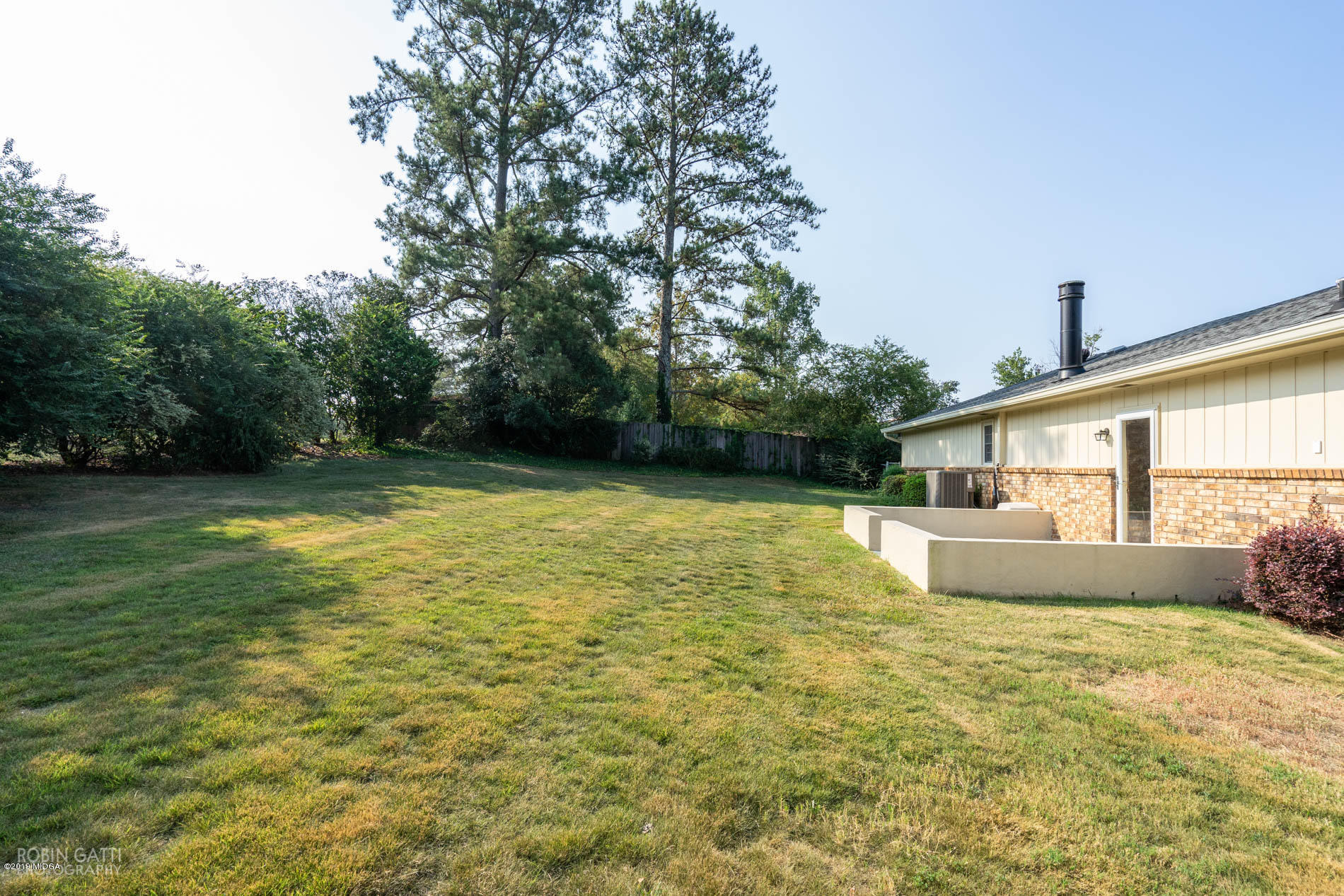 6702 Goodall Mill Road Macon, GA 31216 - Photo 5 of 32 a view of a swimming pool with an outdoor seating