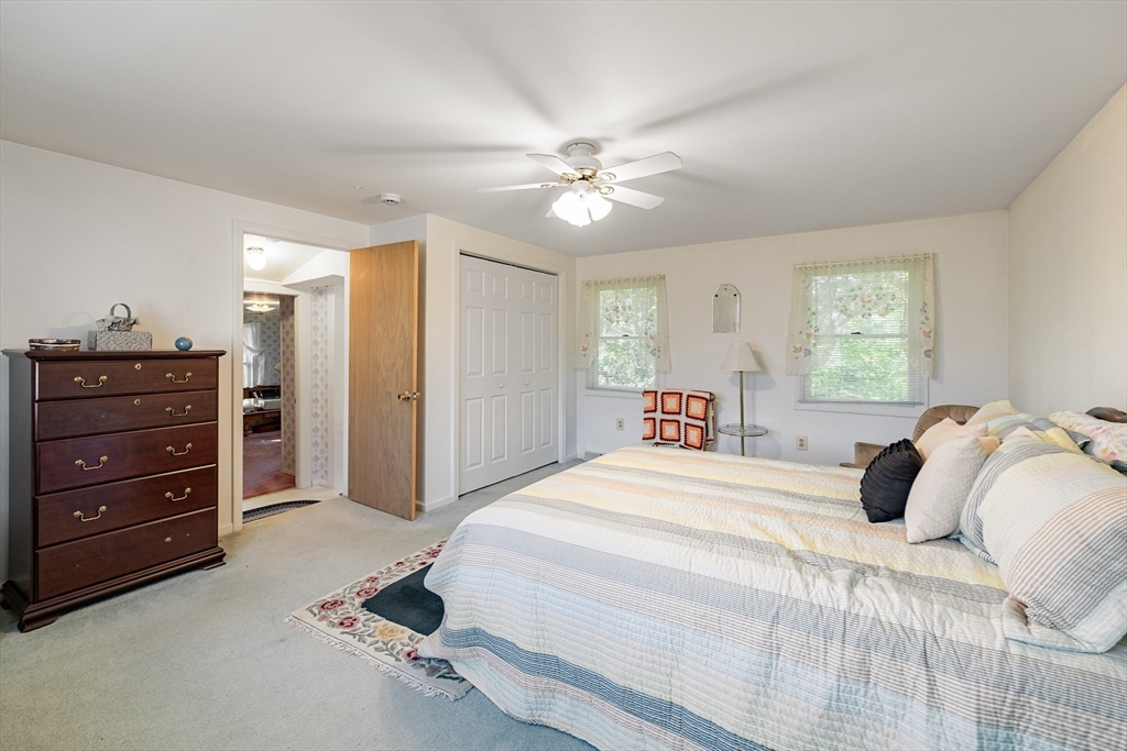 111 Thaddeus Street Chicopee, MA 01020 - Photo 18 of 32 a bedroom with a bed and a dresser