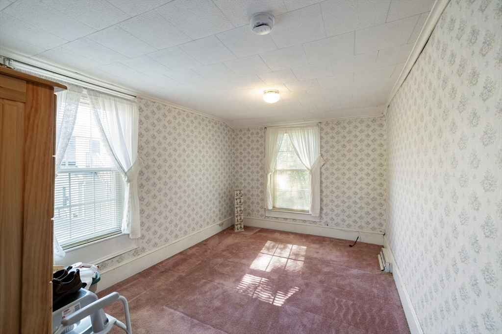 111 Thaddeus Street Chicopee, MA 01020 - Photo 22 of 32 an empty room with windows