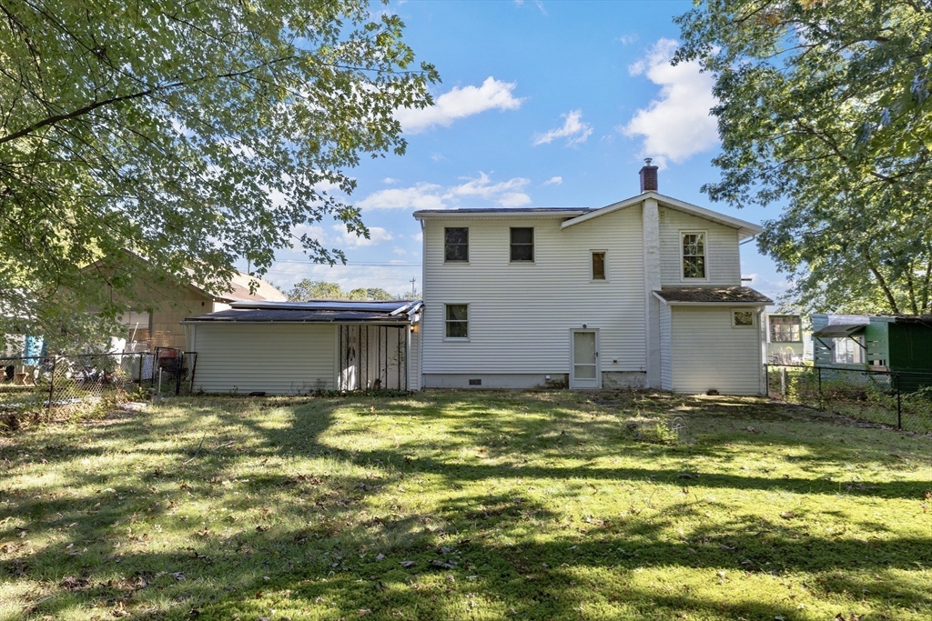 111 Thaddeus Street Chicopee, MA 01020 - Photo 25 of 32 a view of a house with a yard