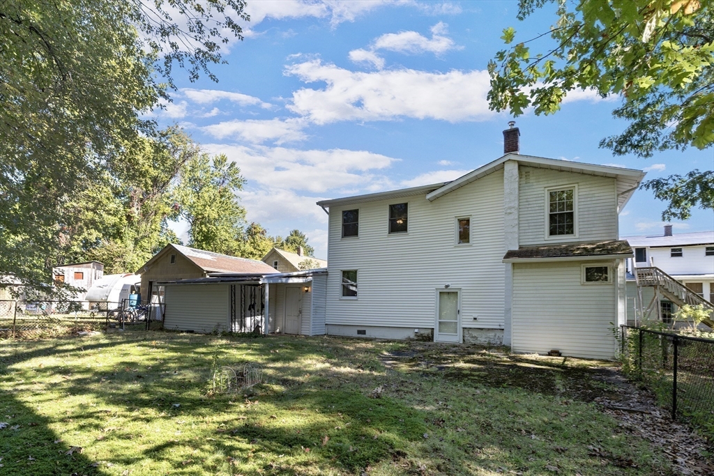 111 Thaddeus Street Chicopee, MA 01020 - Photo 26 of 32 a front view of house with a garden
