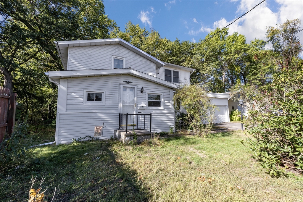 111 Thaddeus Street Chicopee, MA 01020 - Photo 4 of 32 a view of a house with a yard