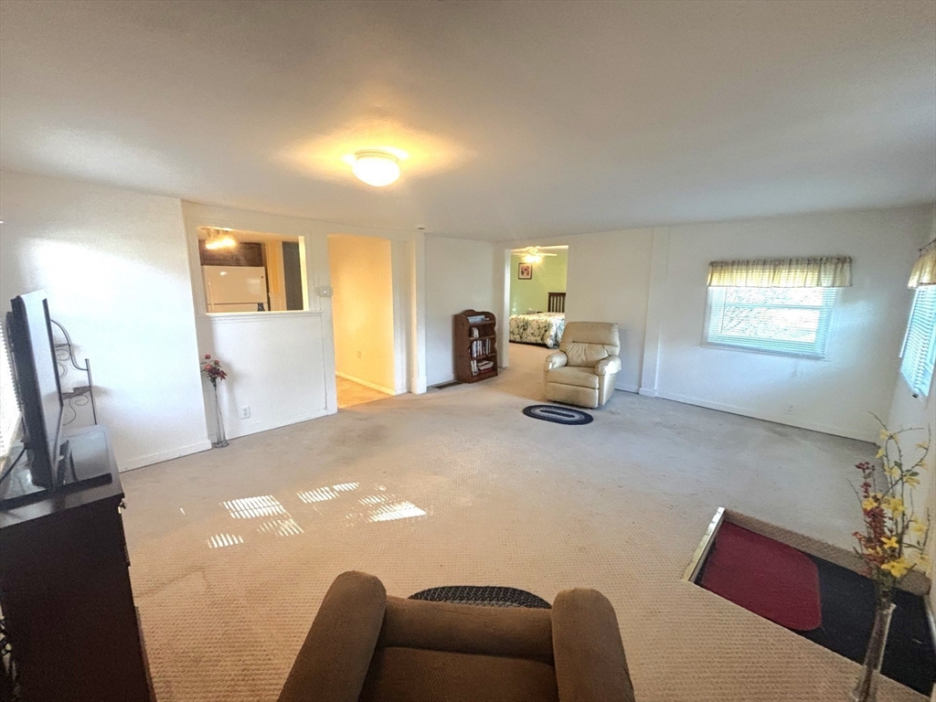 111 Thaddeus Street Chicopee, MA 01020 - Photo 6 of 32 a bed room with furniture and a window