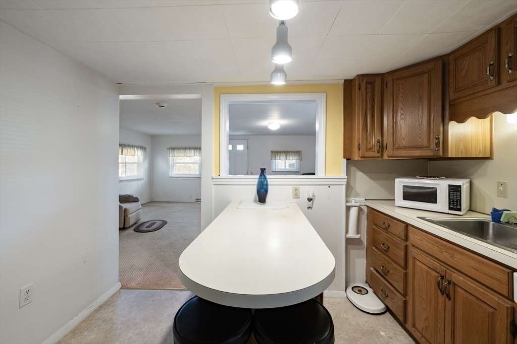 111 Thaddeus Street Chicopee, MA 01020 - Photo 10 of 32 a very nice looking dining room with a large window