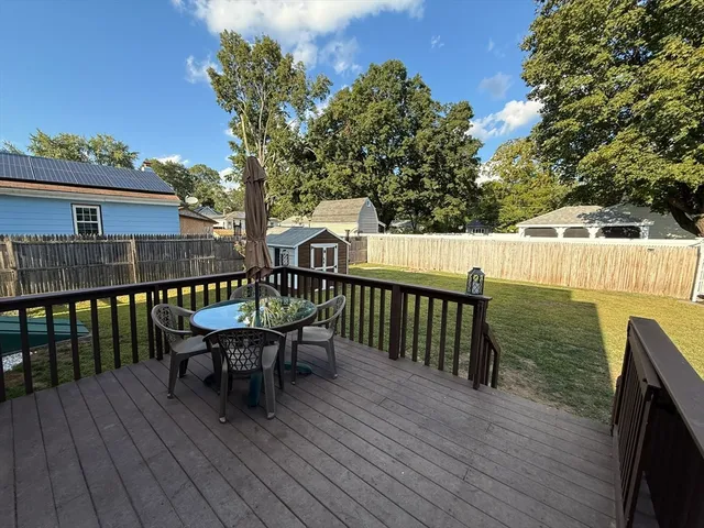a view of a two chairs on the roof deck