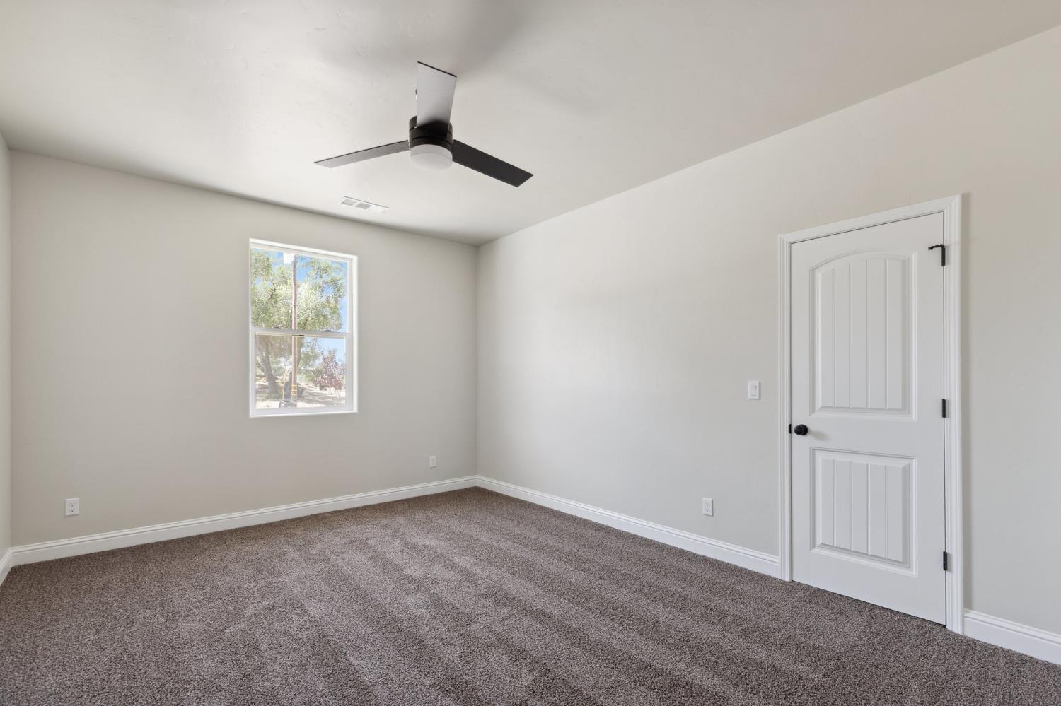 31007 Revis Road Coarsegold, CA 93614 - Photo 16 of 41 a view of an empty room with a window