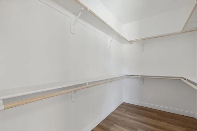 a view of an empty walk in closet