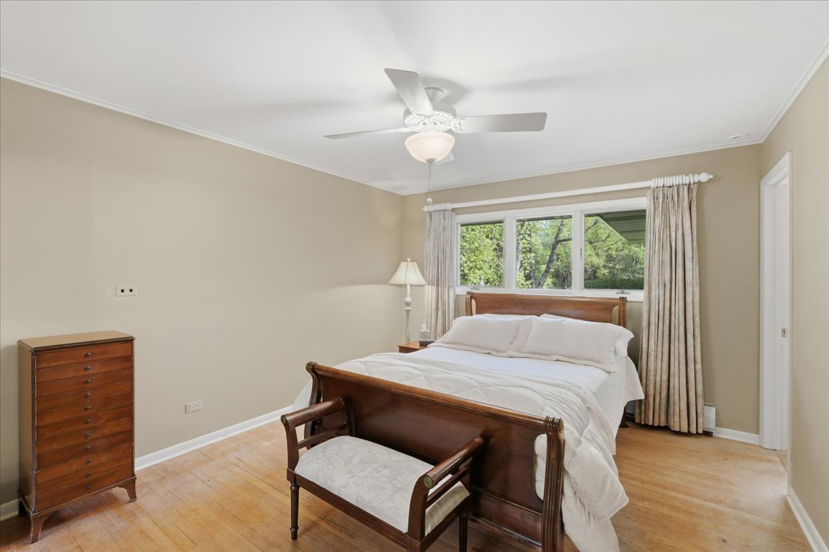 520 Merri Oaks Road Barrington Hills, IL 60010 - Photo 16 of 43 a bed room with a bed and a window