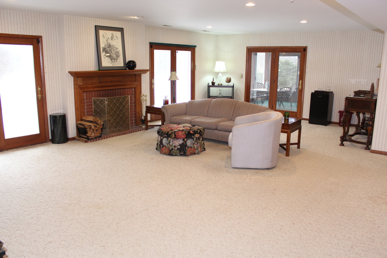 520 Merri Oaks Road Barrington Hills, IL 60010 - Photo 18 of 31 a living room with furniture and a fireplace