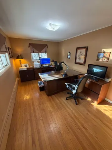 a bathroom with a sink a toilet and a shower