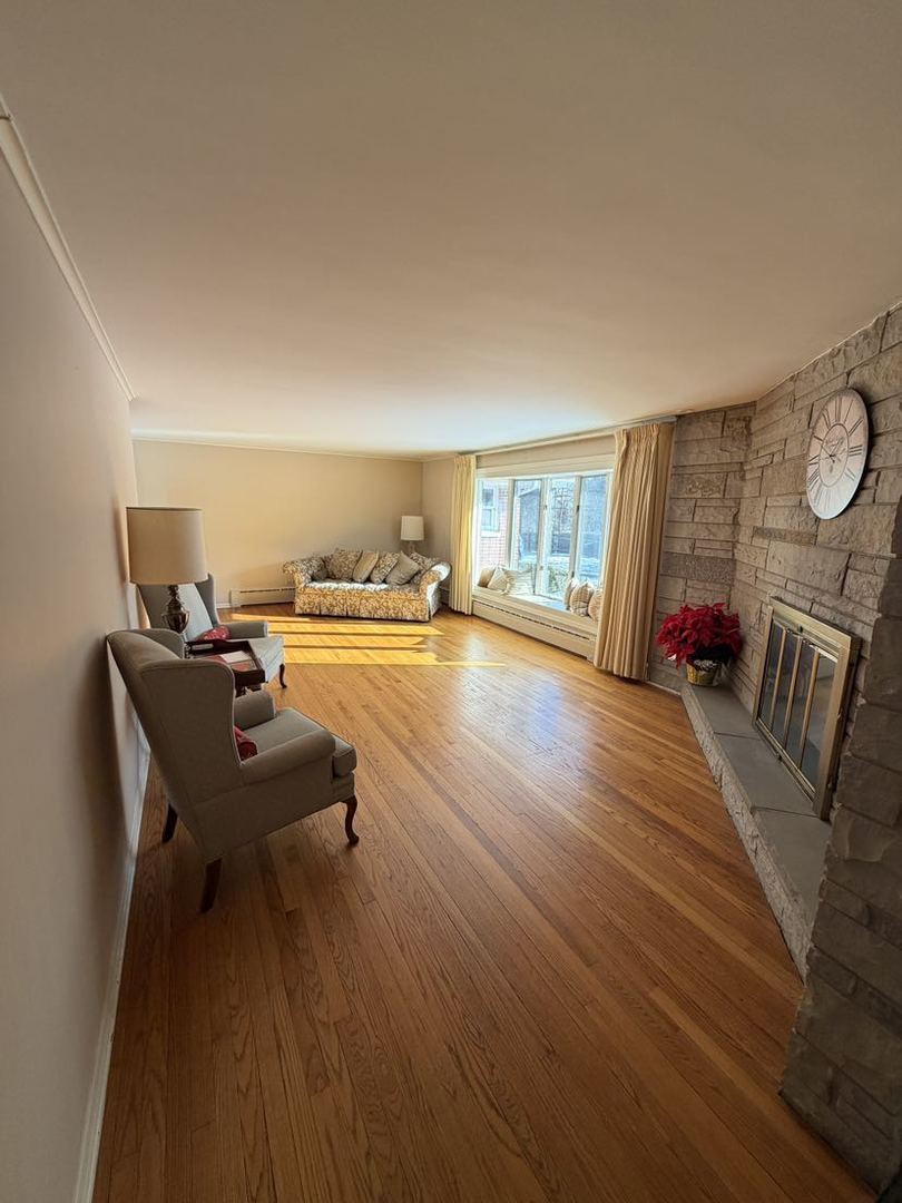 520 Merri Oaks Road Barrington Hills, IL 60010 - Photo 31 of 31 a living room with furniture and a wooden floor