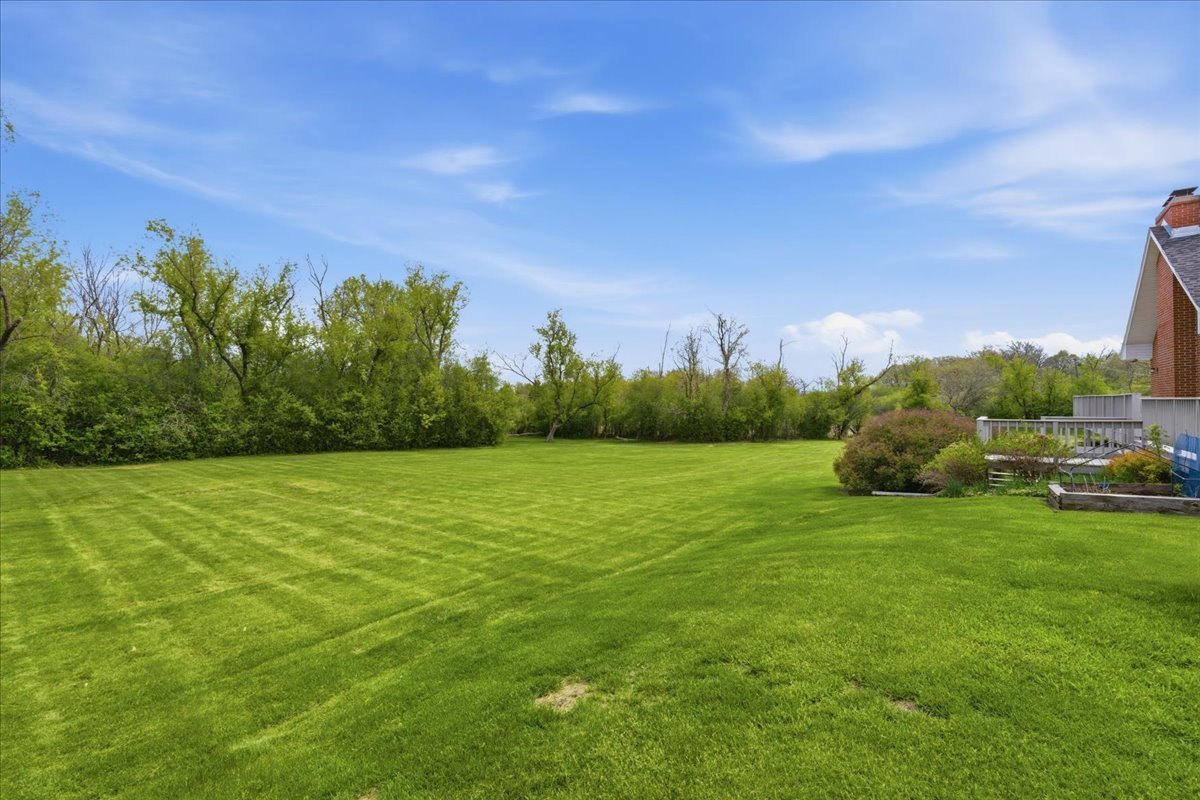 520 Merri Oaks Road Barrington Hills, IL 60010 - Photo 32 of 43 a view of a field of grass and trees