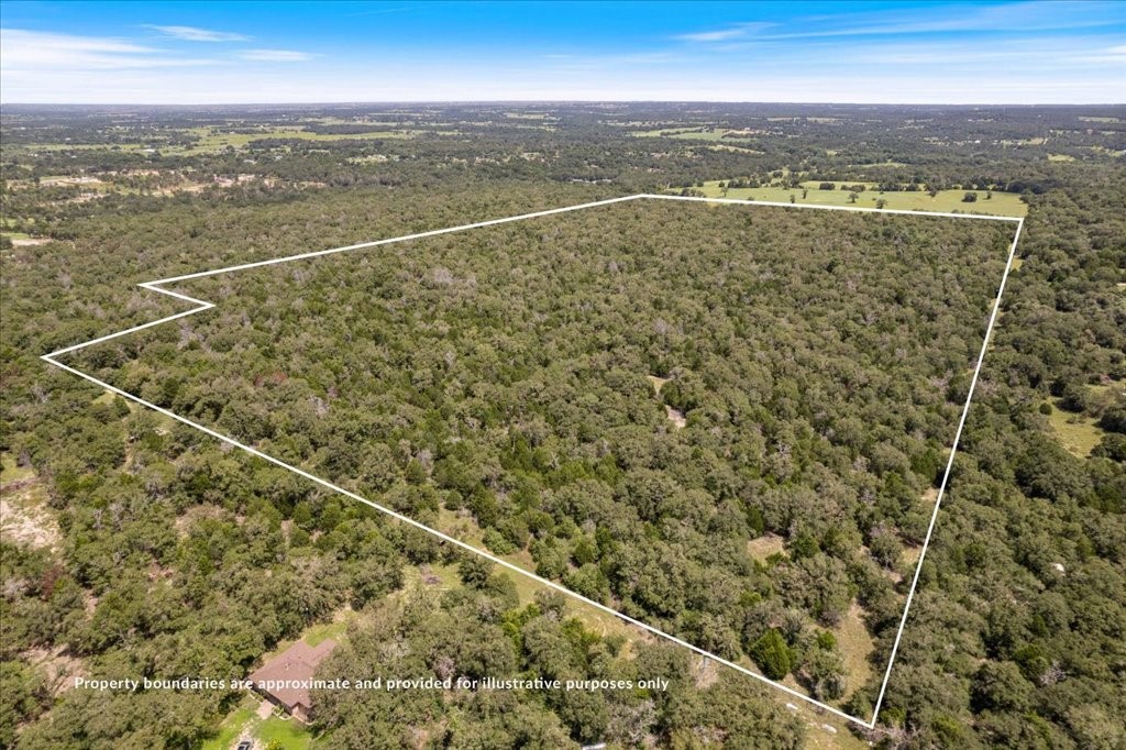 0 Hidden Oaks Drive Elgin, TX 78621 - Photo 2 of 11 a view of a city with an ocean